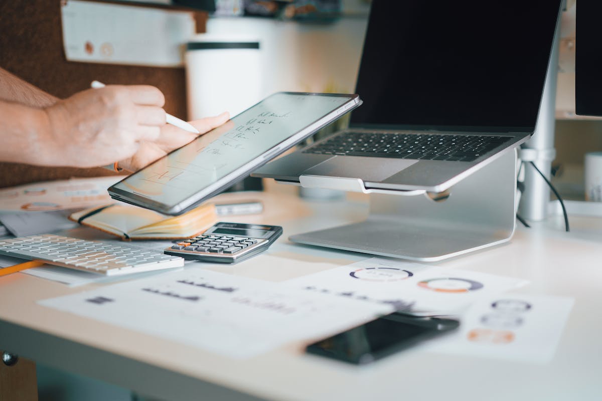 Business owner working with technology and planning